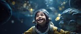 Portrait of a cute asian little girl wearing astronaut costume and smiling in space