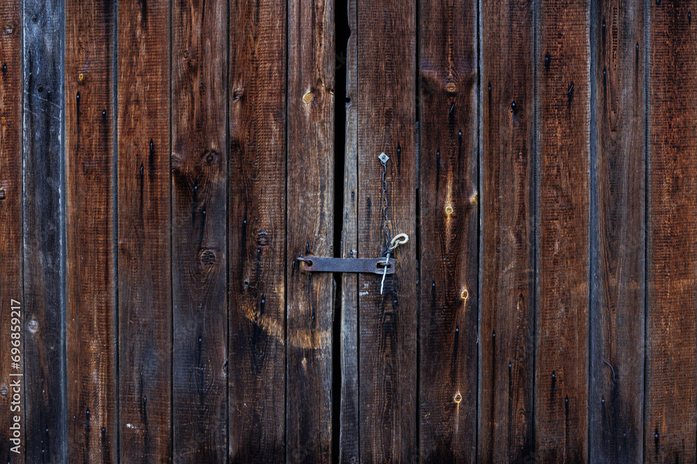 Brown old wooden texture of barn doors Brown old wooden texture of barn doors
