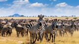 Diverse group of wild animals, including zebras, antelopes, and wildebeests, migrating across the endless Serengeti plains in search of fresh grazing grounds.