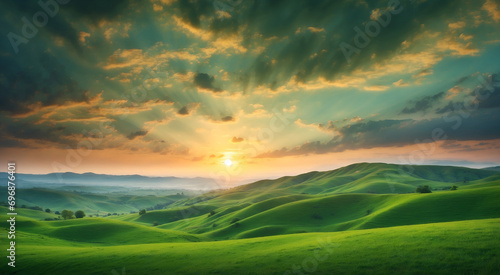 Beautiful sunset over the green mountain hills landscape