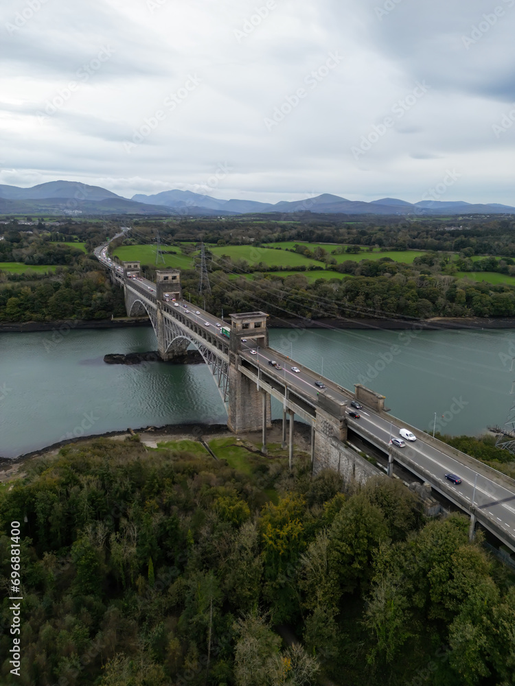 Aerial View Of Britannia Bridge carries road and railway across the Menai Straits between, Snowdonia and Anglesey. Wales, United Kingdom Aerial Aerial View Of Britannia Bridge carries road and railway across the Menai Straits between, Snowdonia and Anglesey. Wales, United Kingdom Aerial