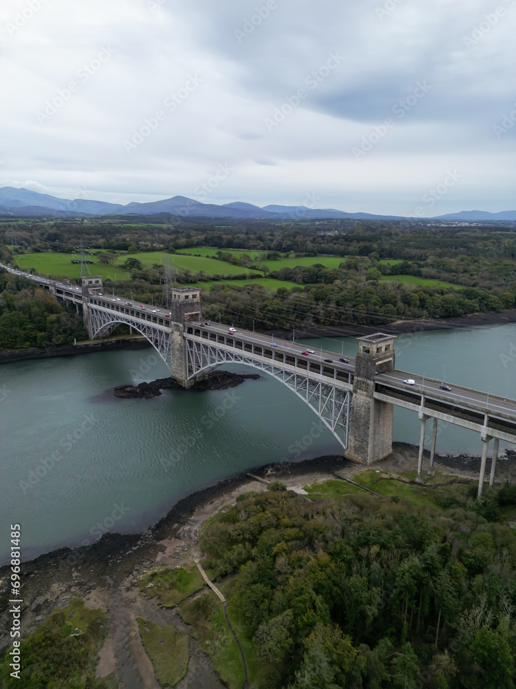 Aerial View Of Britannia Bridge carries road and railway across the Menai Straits between, Snowdonia and Anglesey. Wales, United Kingdom Aerial 
