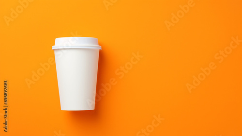 cup of coffee isolated mockup orange background photo
