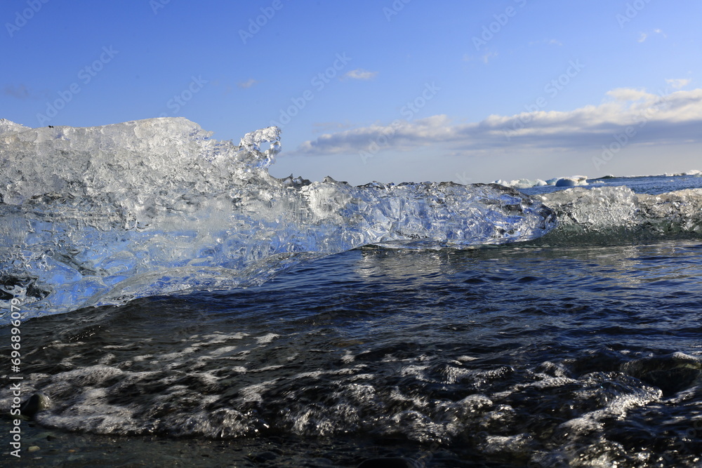 View on a iceberg on the Diamond Beach located south of the Vatnajökull glacier between the Vatnajökull National Park and the town of Höfn View on a iceberg on the Diamond Beach located south of the Vatnajökull glacier between the Vatnajökull National Park and the town of Höfn