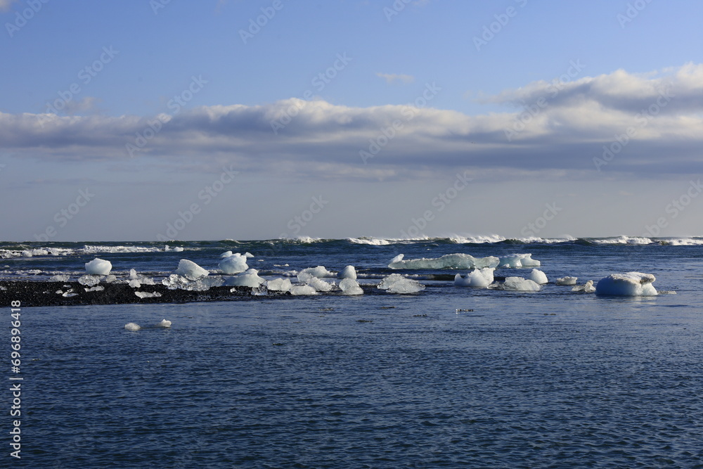 View on a iceberg on the Diamond Beach located south of the Vatnajökull glacier between the Vatnajökull National Park and the town of Höfn View on a iceberg on the Diamond Beach located south of the Vatnajökull glacier between the Vatnajökull National Park and the town of Höfn