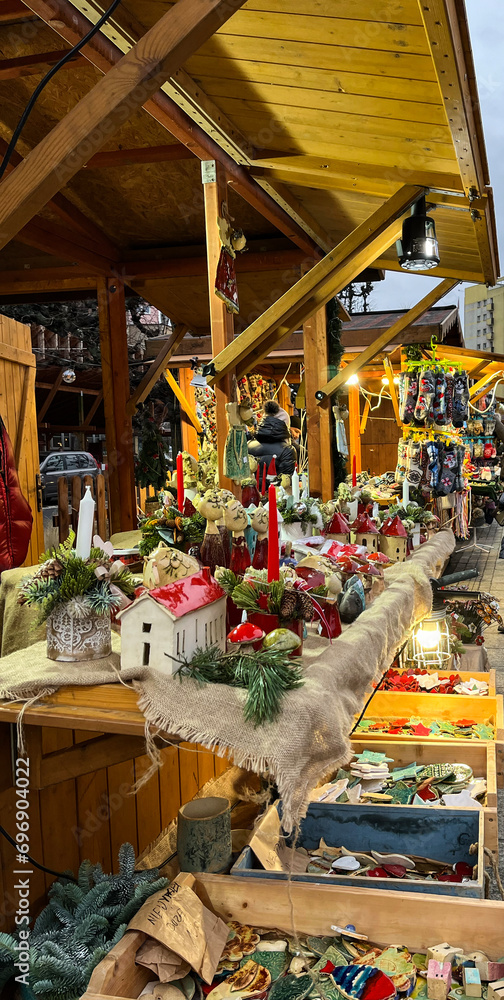 Szczecin, Poland - December, 16, 2023: Christmas market on Flower Alley. Gingerbread, chocolate, Christmas tree decorations.
