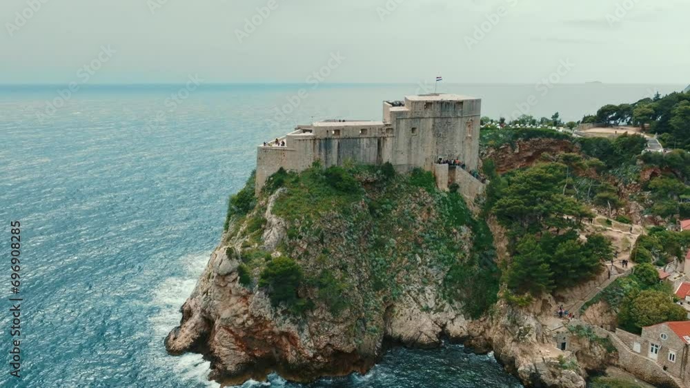 Aerial view of Dubrovnik Old Town fortress, Croatia. Historic centre of Croatia, major tourist attraction in Europe in summer. Aerial view of Dubrovnik Old Town fortress, Croatia. Historic centre of Croatia, major tourist attraction in Europe in summer.