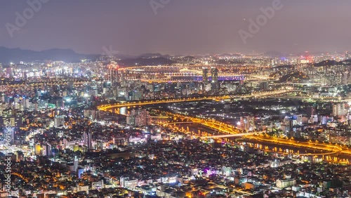 Time-Lapse of Seoul city skyline at night in Korea. photo