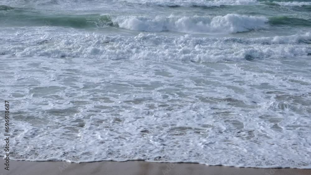 Waves in the Mediterranean Sea during sunset, showcasing the dramatic and windy weather conditions. Waves in the Mediterranean Sea during sunset, showcasing the dramatic and windy weather conditions.