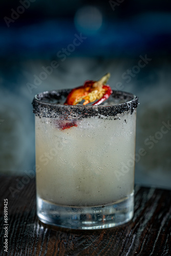 PALOMA CHULA - Del Maguey Puebla Mezcal, Ancho Reyes Chile Liqueur, fresh-squeezed grapefruit and lime juices, agave, and a black lava salted rim photo