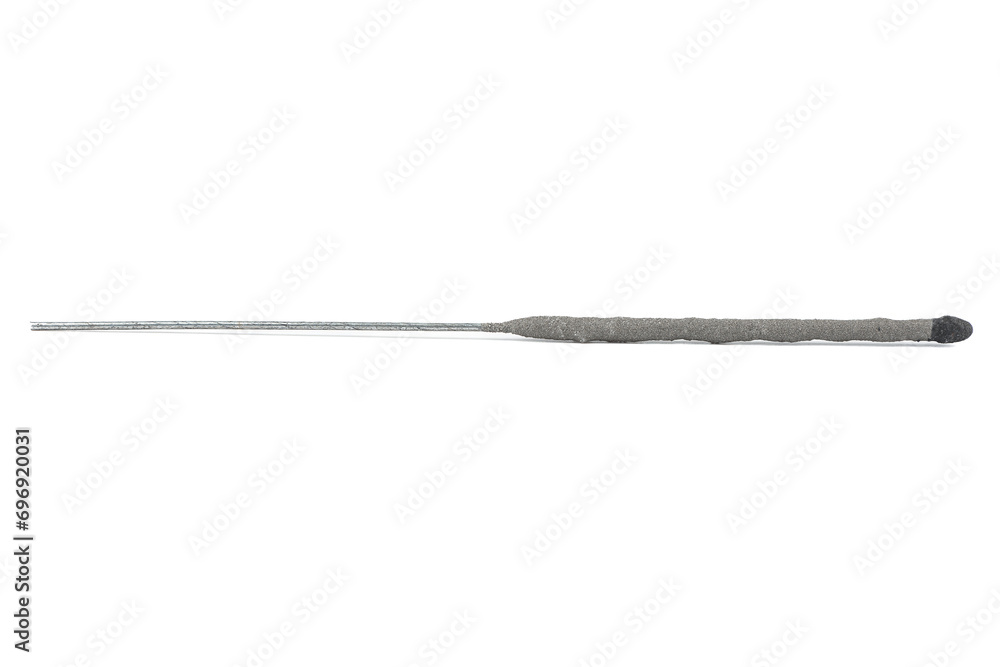 Close up of one unlit sparkler candle isolated on white background. Close up of one unlit sparkler candle isolated on white background.
