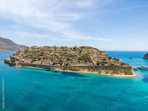Aerial drone view of an old Venetian fortress island and former Leper colony. Spinalonga, Crete, Greece.