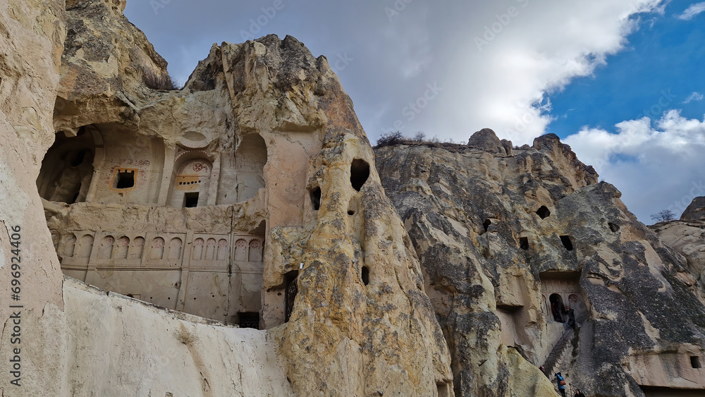 An exposed cave within Cappadocia's Open-Air Museum stands as a raw testament to ancient architectural wonders.