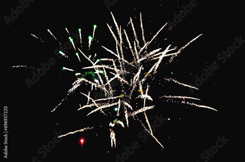 Fireworks set off on New Year's Eve on dark sky