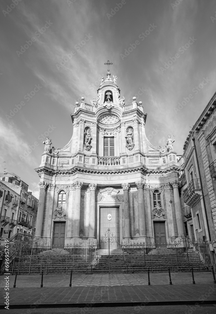 CATANIA, ITALY - APRIL 7, 2018: The baroque facade of church Basilica Collegiata.