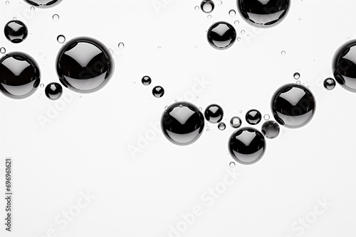 droplets spherical, thick black liquid, on white background