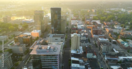 Lexington, Kentucky. High office buildings in downtown district of Lexington Kentucky, USA. American megapolis with business financial district at sunset photo