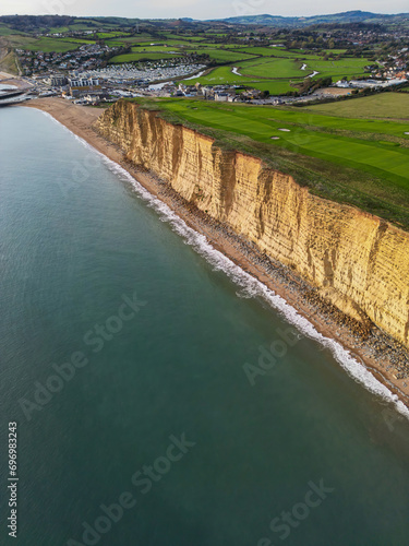 The towering cliffs at West Bay on the Jurassic Coast of Dorset England UK