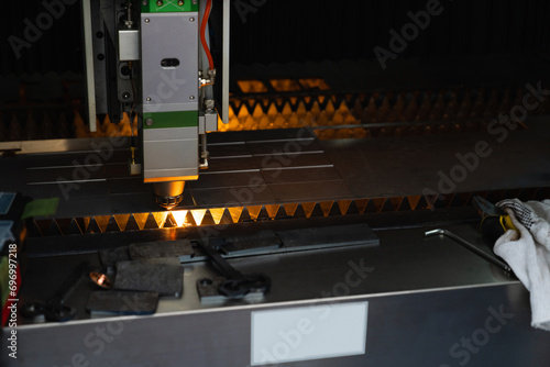 Automatic machine for cutting metal. Smart factory.