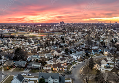 Long Island Aerial shot Nassau County at Sunset pink sky clouds photo
