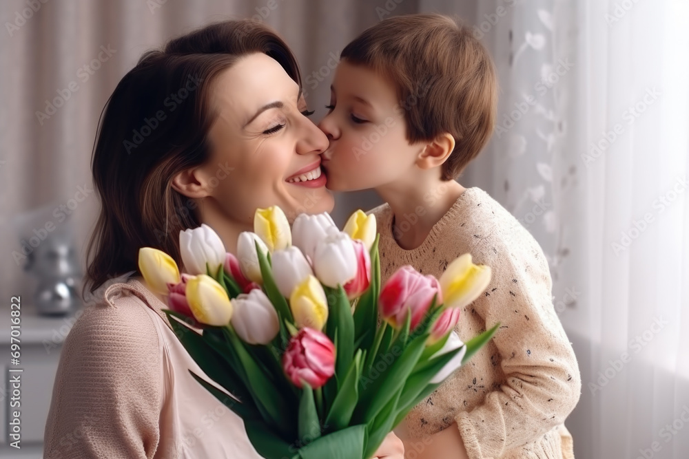 Happy mother's day! Child congratulates mom and gives her a bouquet of tulips. Happy mother's day! Child congratulates mom and gives her a bouquet of tulips.