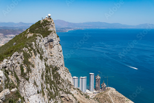 The top of the Rock of Gibraltar with the coastline and Alboran or Mediterranean sea in the background. photo