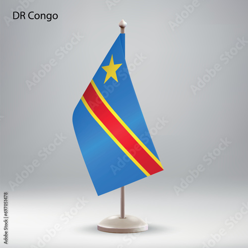 Flag of DR Congo hanging on a flag stand.