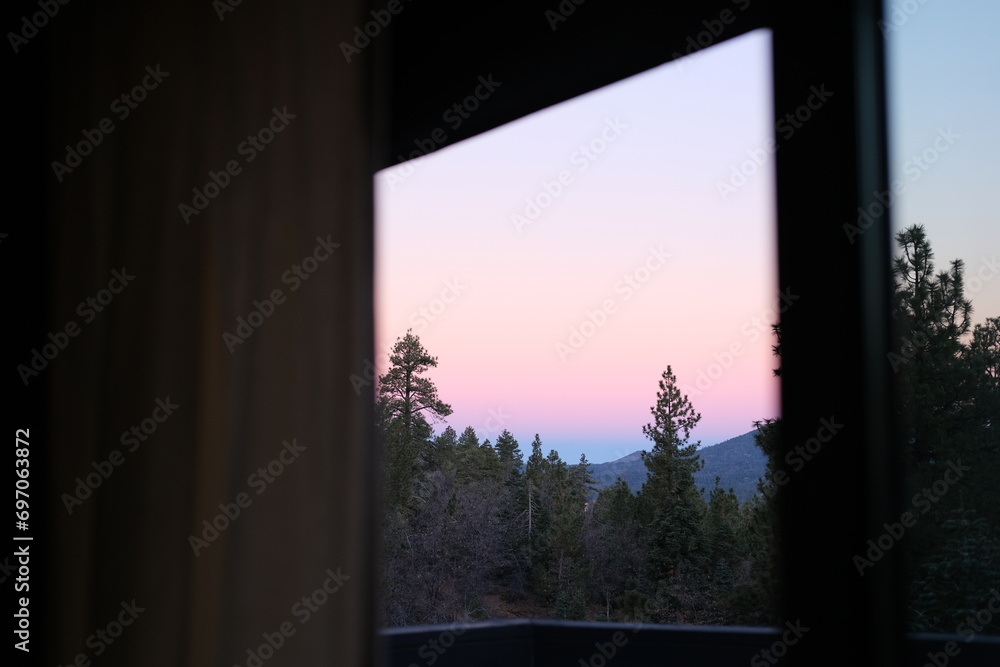 sunset behind the window