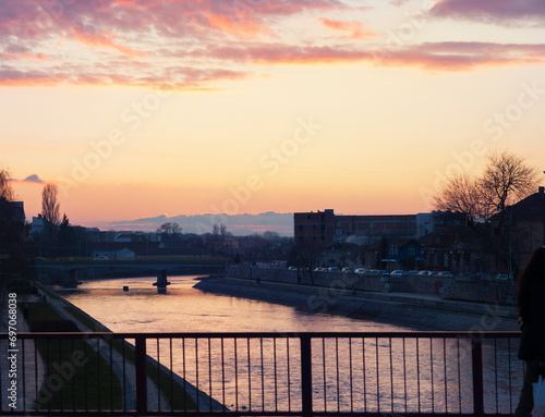 During sunset, a purple sky looms above the city of Niš. photo