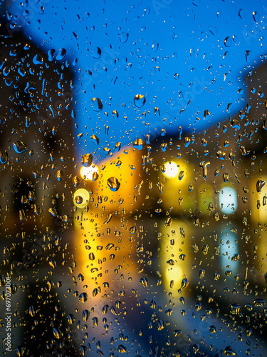Enchanting Night Raindrops: Capturing the Ethereal Beauty of Bokeh in a Serene Nocturnal Symphony of Light and Water