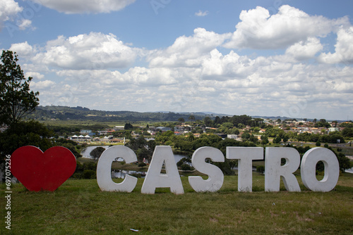 Castro Paraná Brazil Welcome sign at the top of the hill in the city of Castro with an aerial view in the background