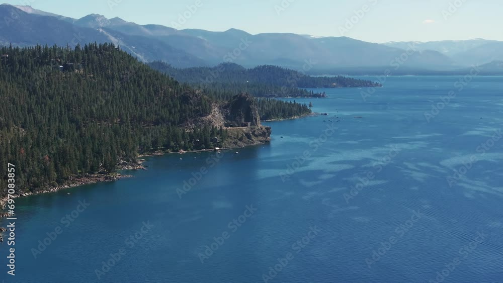 Beautiful aerial view of the Tahoe lake from above in California, USA. Wild forests, fresh air and mountains of California. Beautiful aerial view of the Tahoe lake from above in California, USA. Wild forests, fresh air and mountains of California.