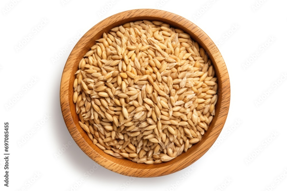 Isolated wooden bowl of wheat grains on white background, top view. Isolated wooden bowl of wheat grains on white background, top view.