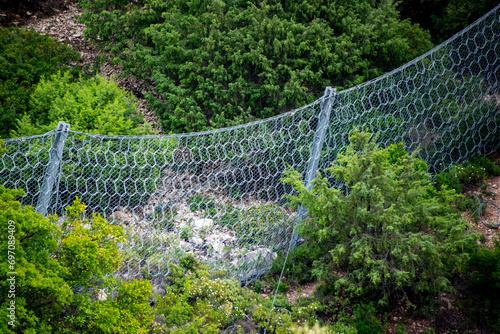 Konstfotografi Rockfall Catchment Fence on a Hill