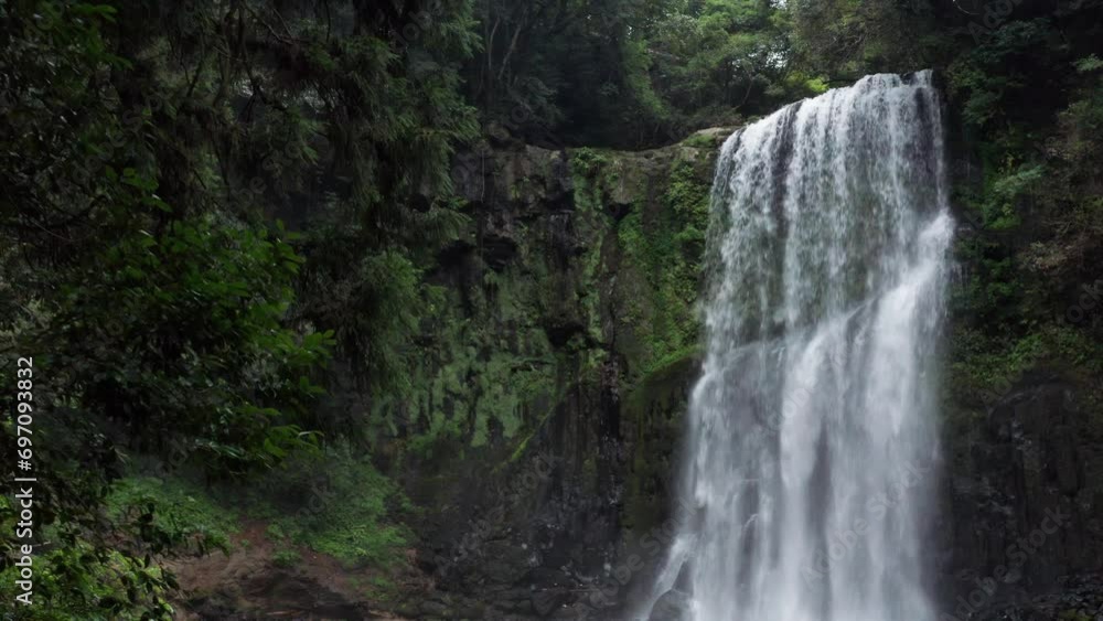 Large powerful waterfall in rainforest Large powerful waterfall in rainforest
