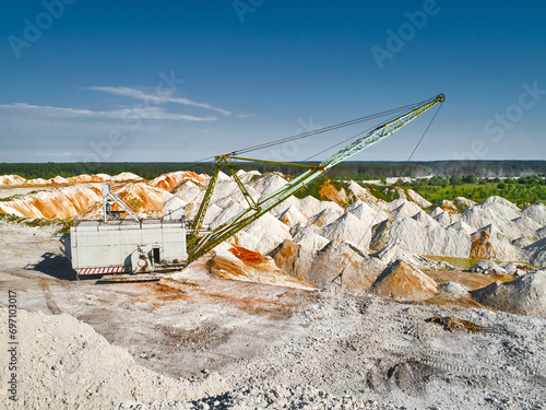 Walking dragline with hoist digs calx in chalkquarry photo