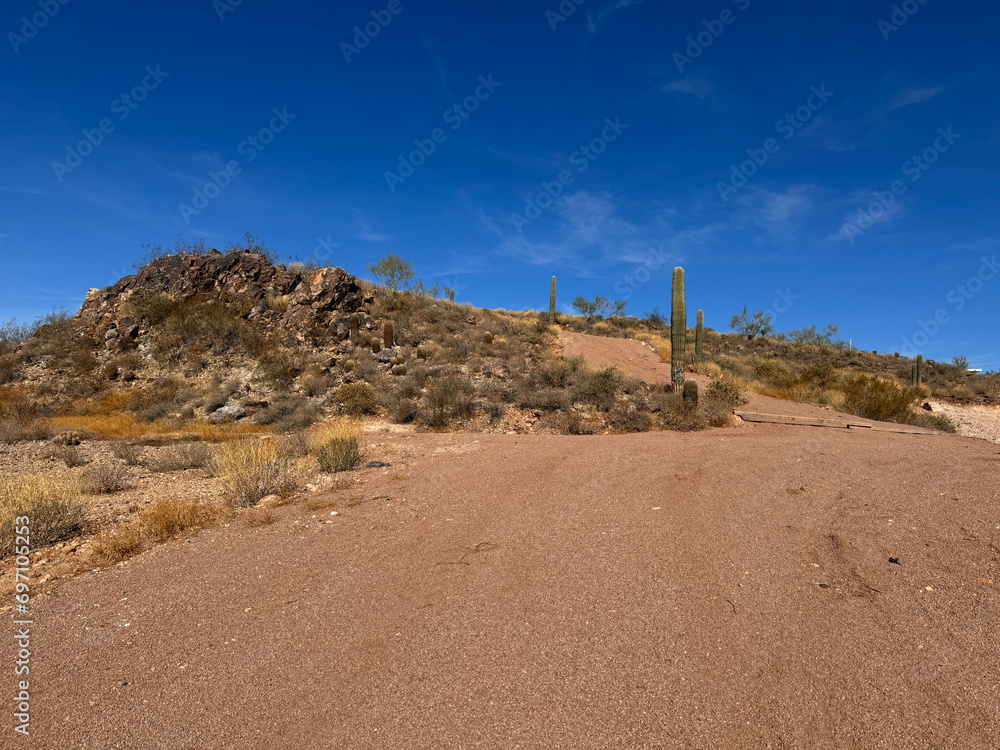 Rural plot of desert land in Apache Junction, Arizona, on a gravel road