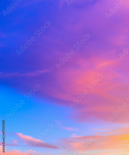 Sky midday sunlight beams rainbow pastel gradient pale orange-pink purple-blue dramatic. Beautiful sunny day soft light clouds blur background.