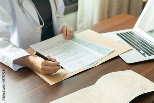 medical writer or medical communicator are writing clinical trial documents that describe research results, product use, and other medical information. photo