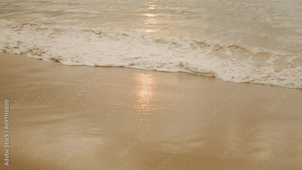 Close-up wave sea sand beach. Sea shells golden sunset tropical beach summer. Close-up wave sea sand beach. Sea shells golden sunset tropical beach summer.
