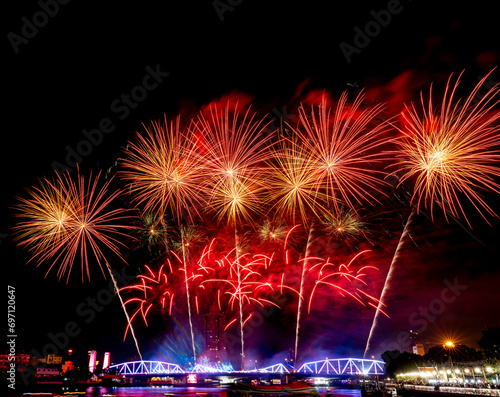 A colorful set of fireworks set off on the Buddhayodfa Chulalok Maharat Bridge in Bangkok. During the New Year Festival of 2024