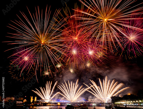 A colorful set of fireworks set off on the Buddhayodfa Chulalok Maharat Bridge in Bangkok. During the New Year Festival of 2024