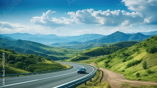 Beautiful curve asphalt road on the green mountain with more clouds on mountain and blue sky background. Generative AI. photo
