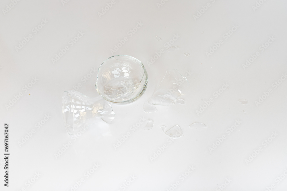 Broken glass vase with sharp edges isolated on white background Broken glass vase with sharp edges isolated on white background