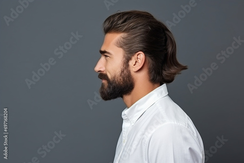 a handsome bearded man with long hair