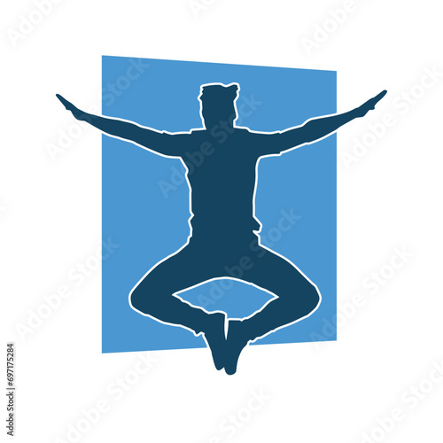 Silhouette of a male dancer in action pose. Silhouette of a slim man in dancing pose.
