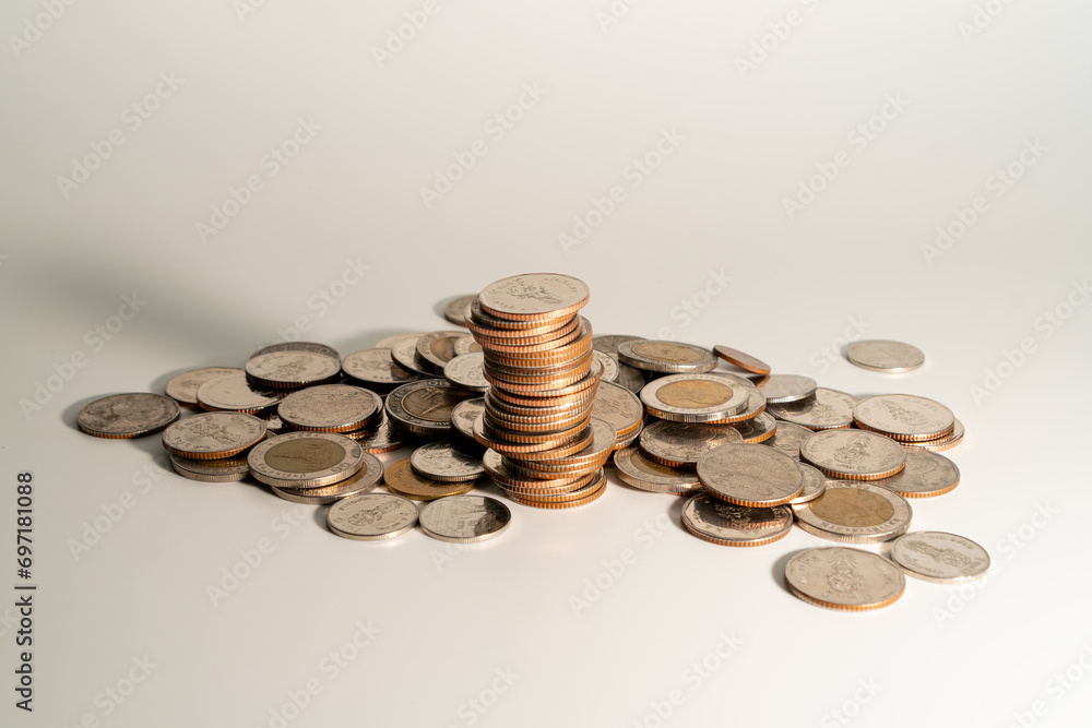 Coins stacked on each other, isolated on a white background. Coins stacked on each other, isolated on a white background.