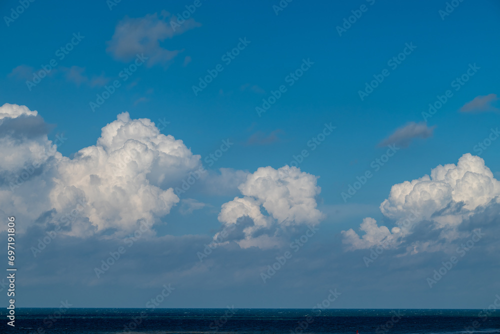 Blue sky, clouds and the sea at Katwijk, The Netherlands. Blue sky, clouds and the sea at Katwijk, The Netherlands.