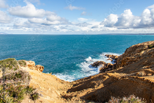 Port aux Princes, Tunisia, Cliffs and Rocks, Mediterranean Sea landscape with beautiful blue sky. Heavenly Escape. Takelsa