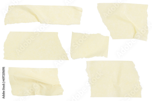Set of pieces of yellow paper tape on a blank background. photo